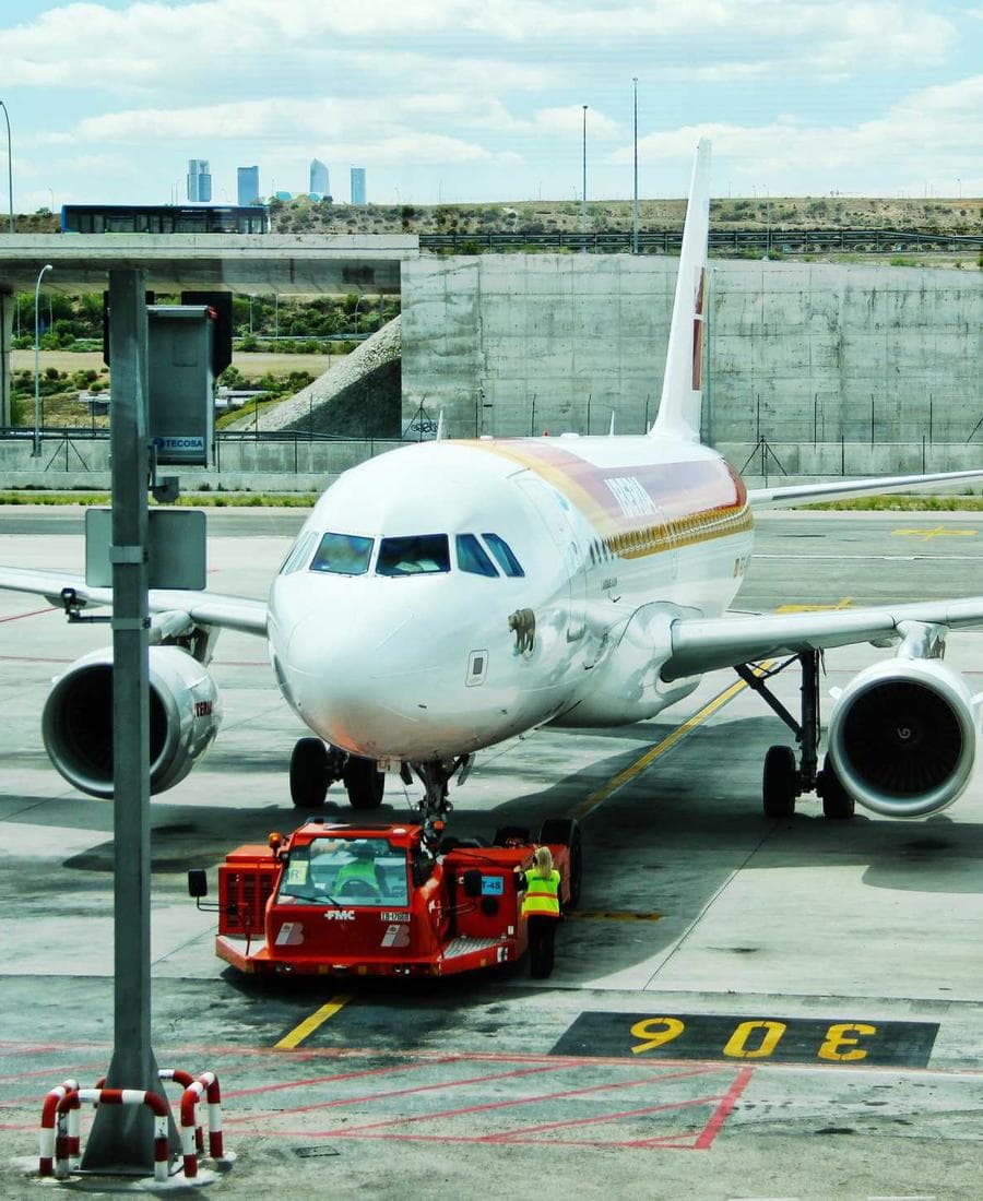 Passenger aircraft parked at a terminal gate